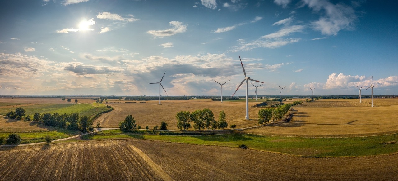Panorama of a beautiful landscape with wind turbines in good weather