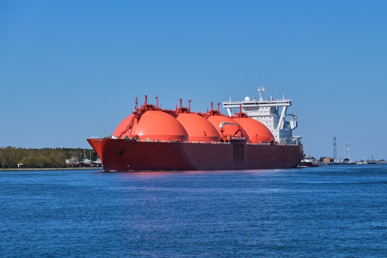 LNG or liquified natural gas tanker entering port on a sunny day in Klaipeda, Lithuania. Alternative gas supply, commercial freight, energy crisis