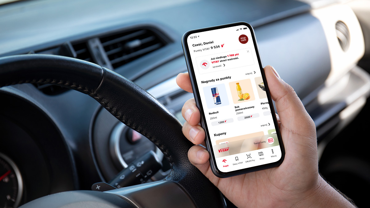 man hand hold phone with isolated screen in the car
