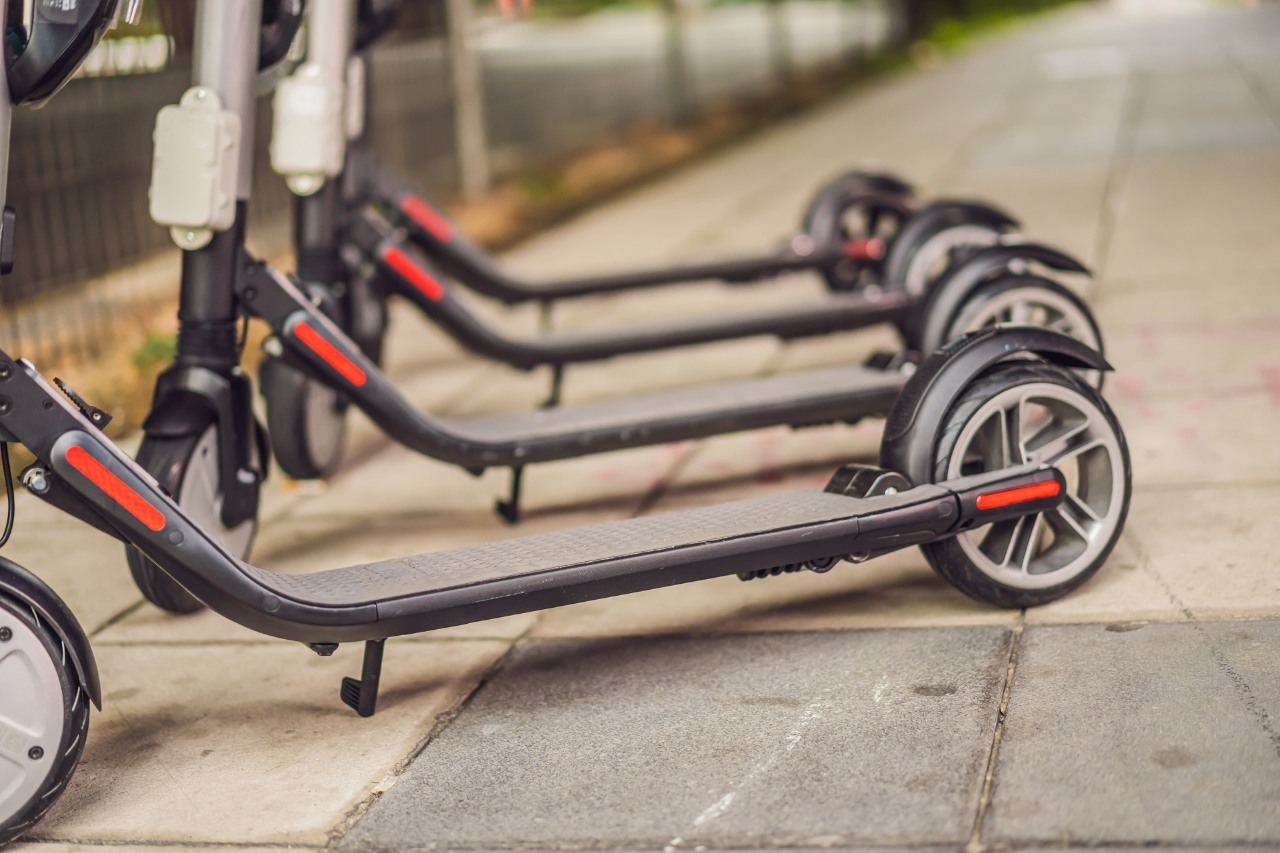 Electric scooters for rent. urban transport. Electric Ride Sharing Scooters Lined Up and Ready to Rent.